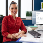 Woman at desk with computer